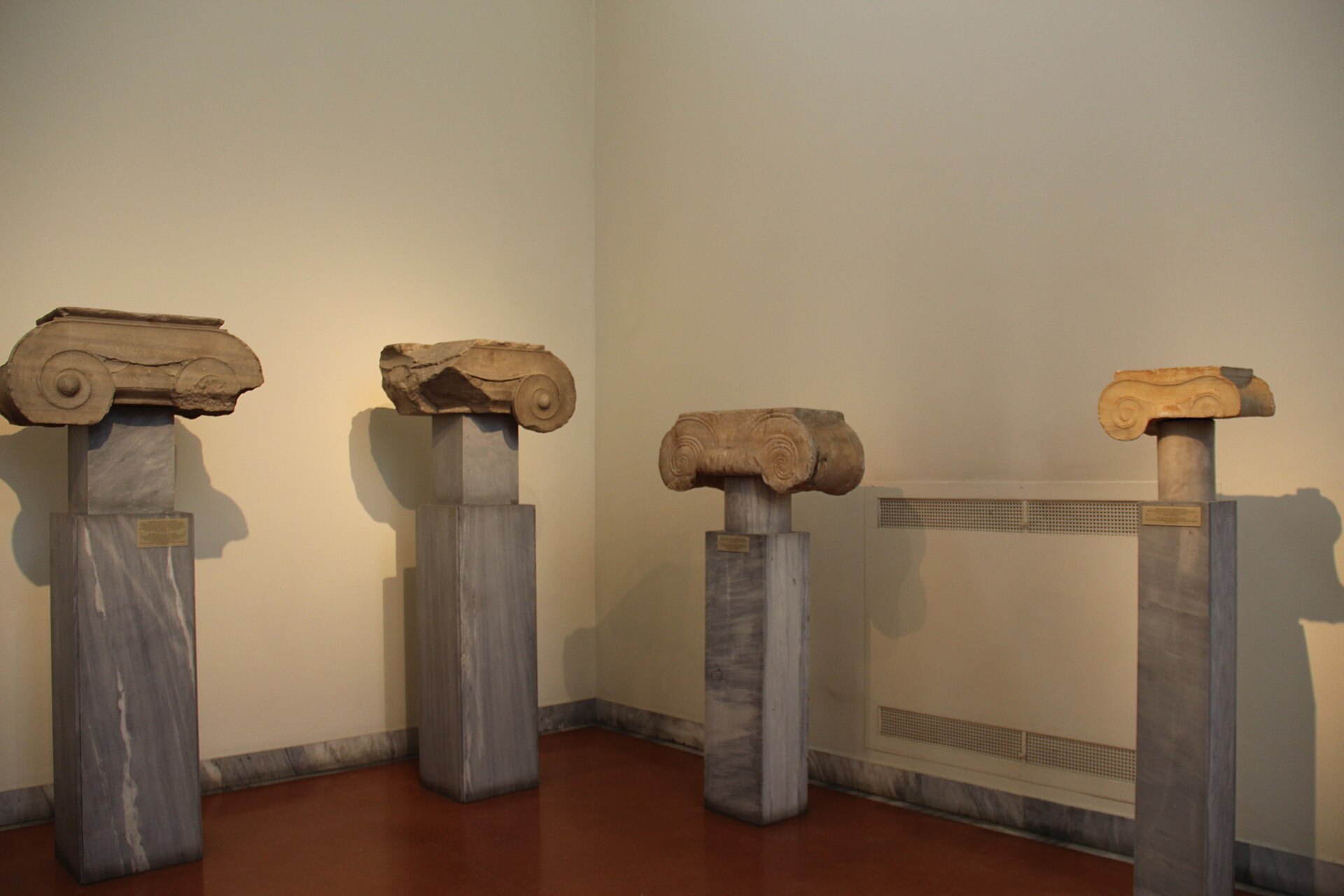 Marble Ionic capitals in a museum.