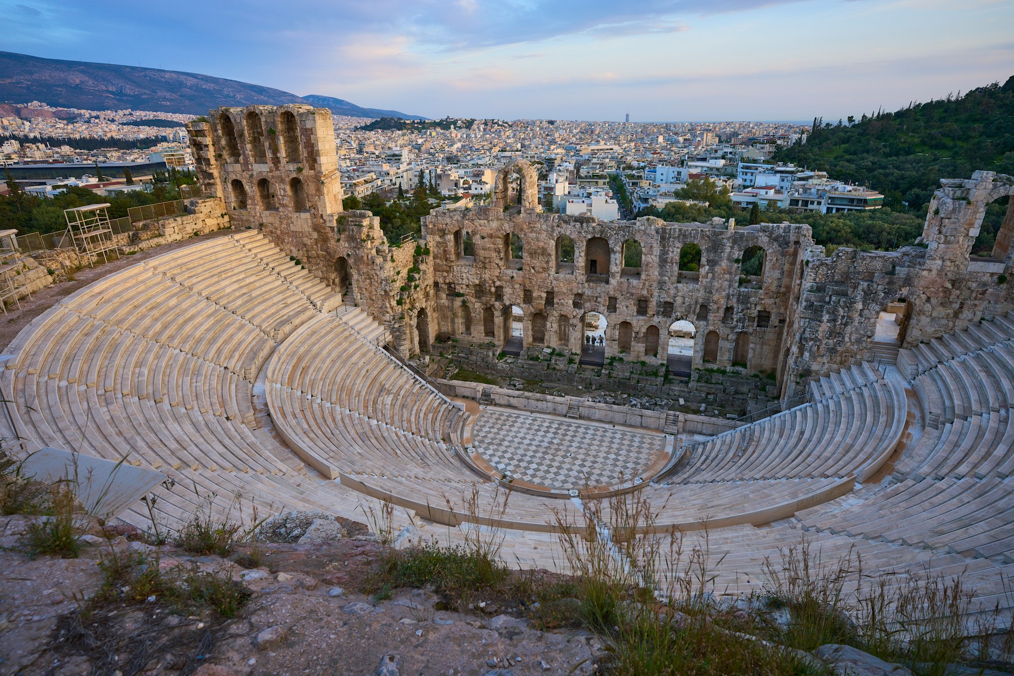The Odeon of Herodes Atticus below the Acropolis, with the city beyond.